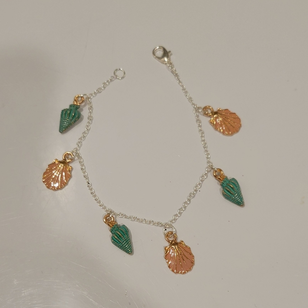 Elegant Silver Bracelet with Green Conch Shells and Pink Clamshell Charms